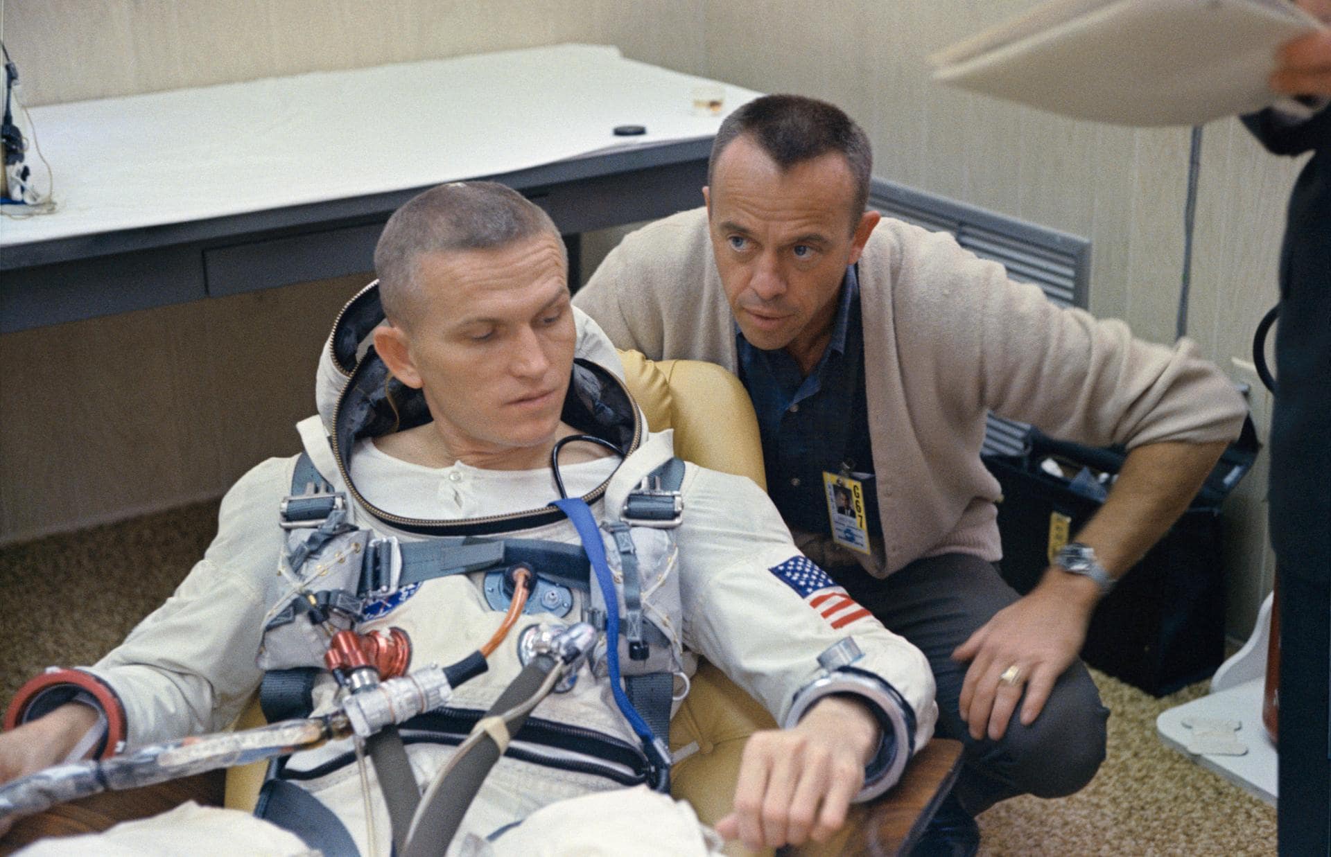 Alan Shepard converses with Frank moments before heading to the launchpad for his Gemini flight.