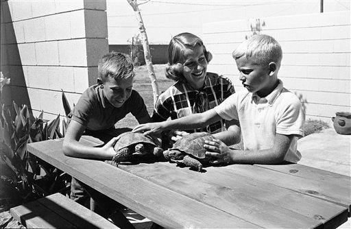Frederick and Edwin show Susan a few of their specimens from their makeshift zoo at their home on Edwards airforce base.