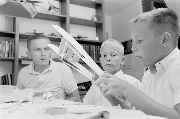 Frank, Edwin and Frederick working on one of the Borman's favourite hobbies, building model airplanes.