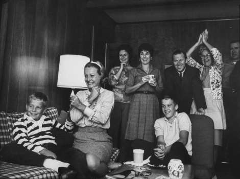 Susan celebrates with family and friends following Frank's successful splashdown after the Gemini 7 mission, December 1965